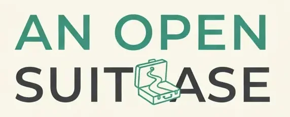An Open Suitcase logo